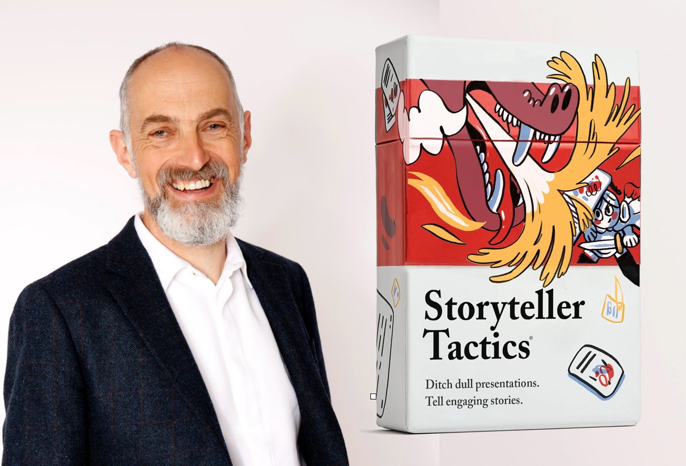Steve Rawling smiling, next to a box of his Storyteller Tactics card deck.